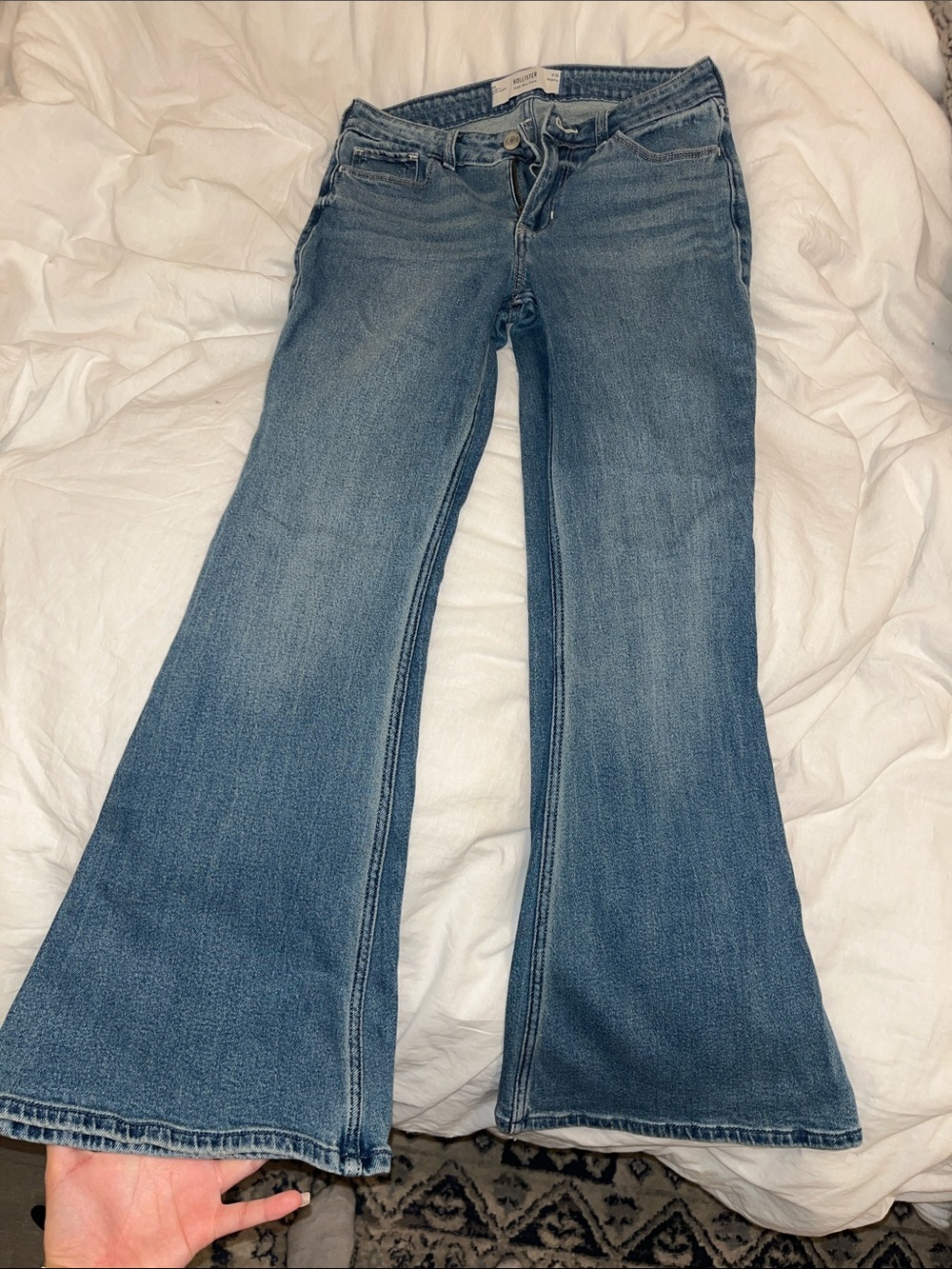 Hollister Women's Flared Jeans in Mid Blue Wash